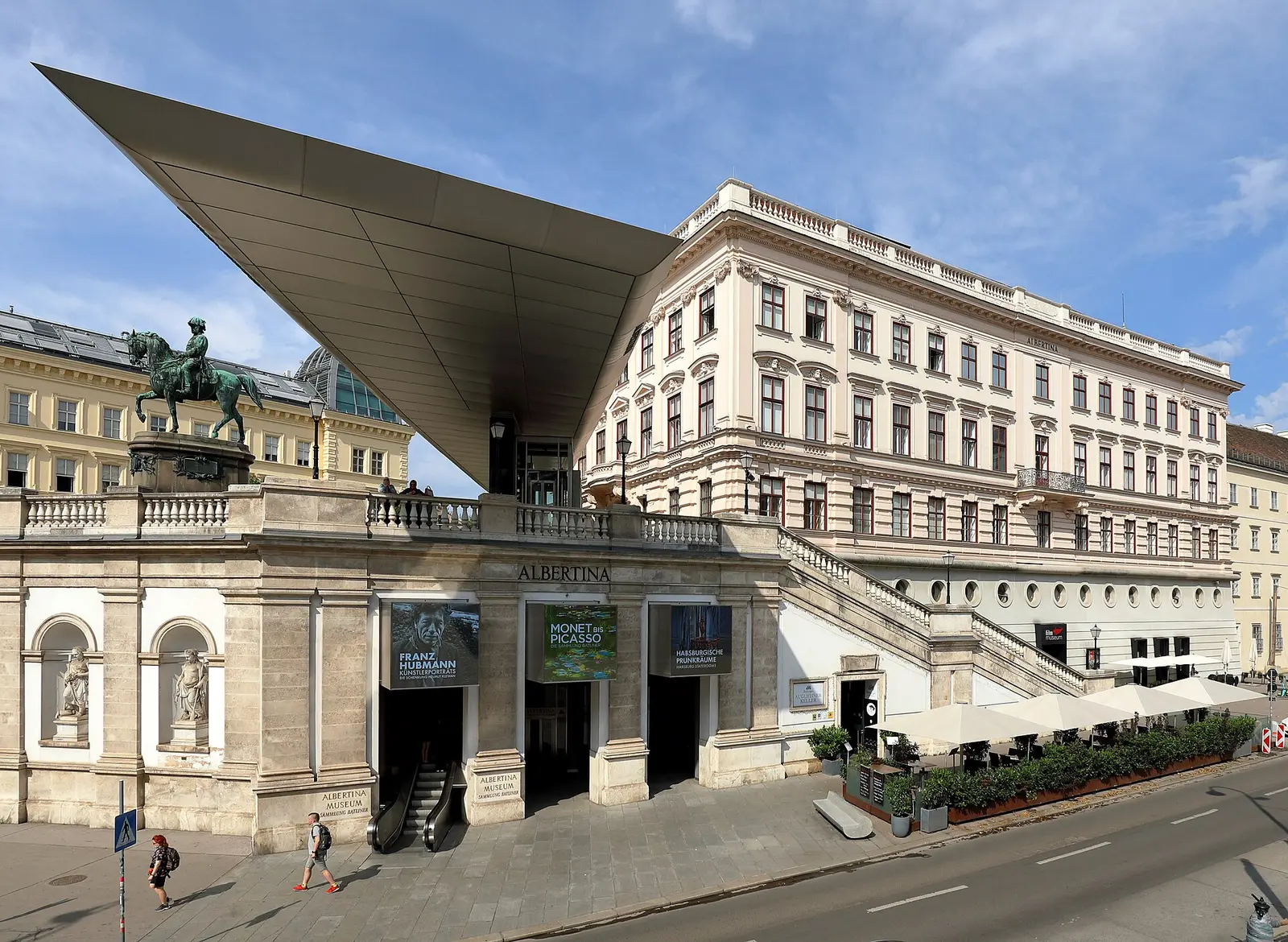 The Albertina museum with its wing roof and the Archduke Albrecht monument in Vienna